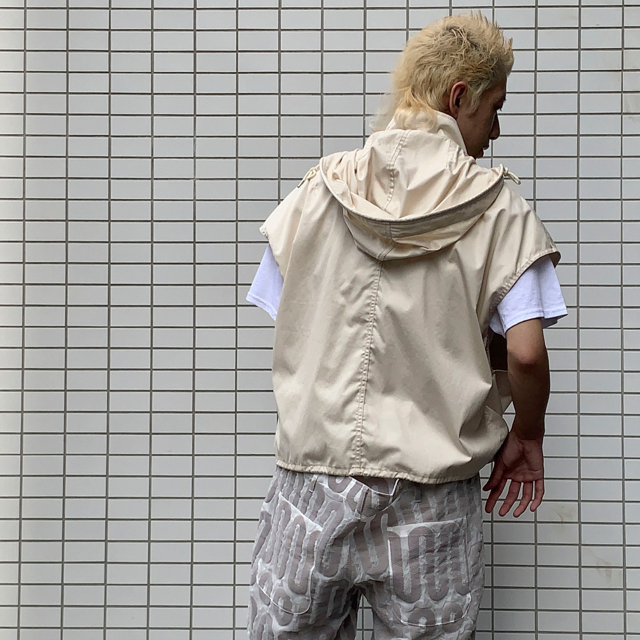 PRODUCT TWELVE "SHORT LENGTH HOODED VEST"