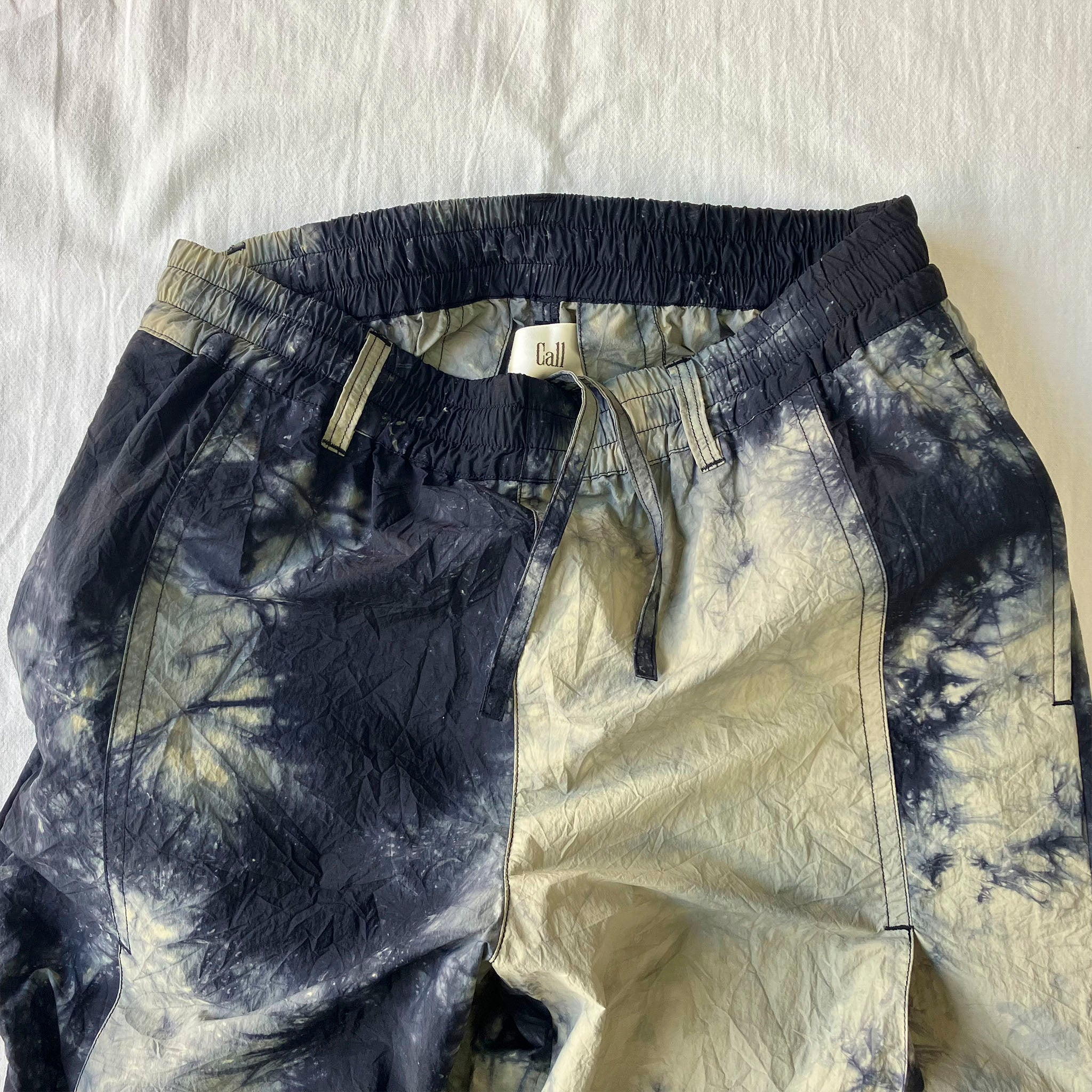 call "4 PLEATS TROUSERS"