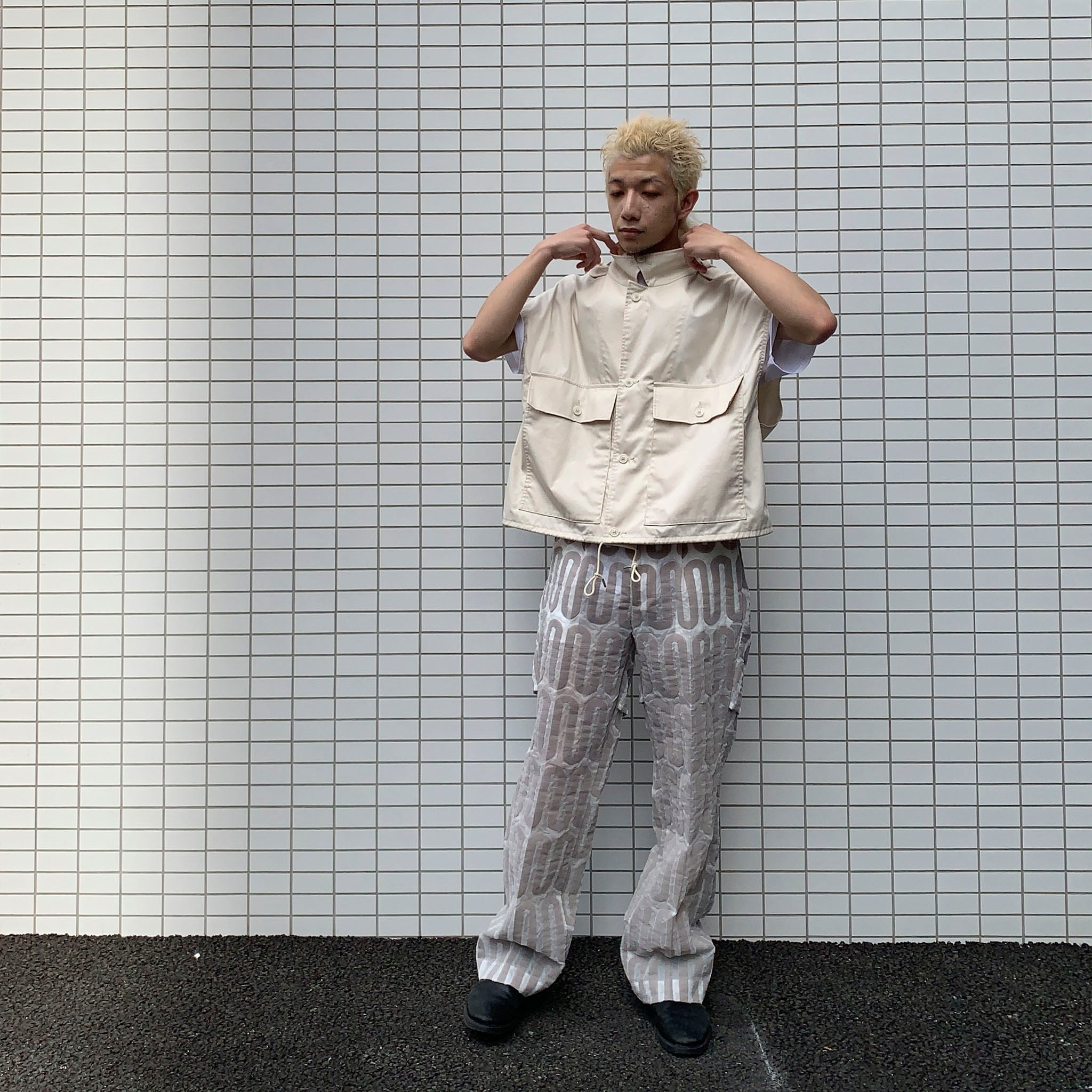 PRODUCT TWELVE "SHORT LENGTH HOODED VEST"