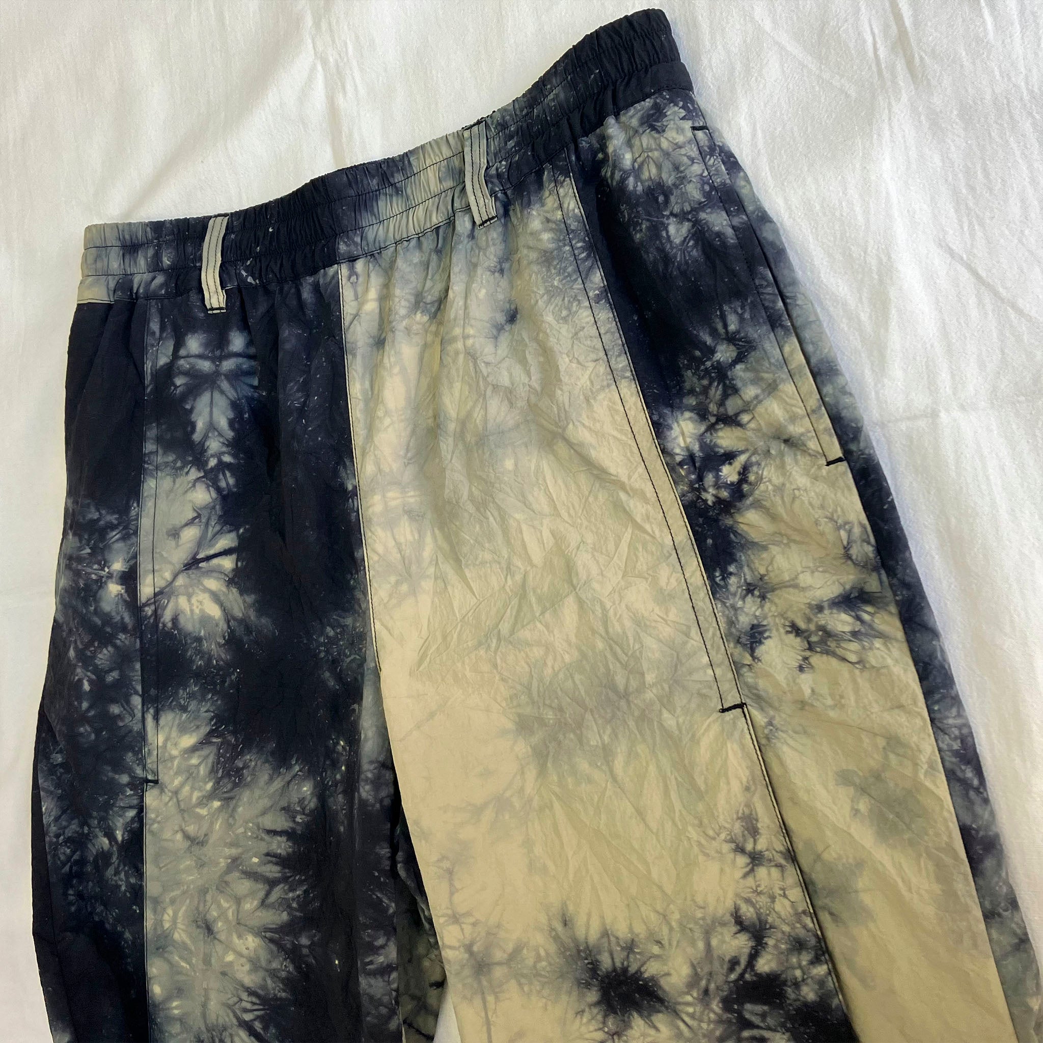 call "4 PLEATS TROUSERS"