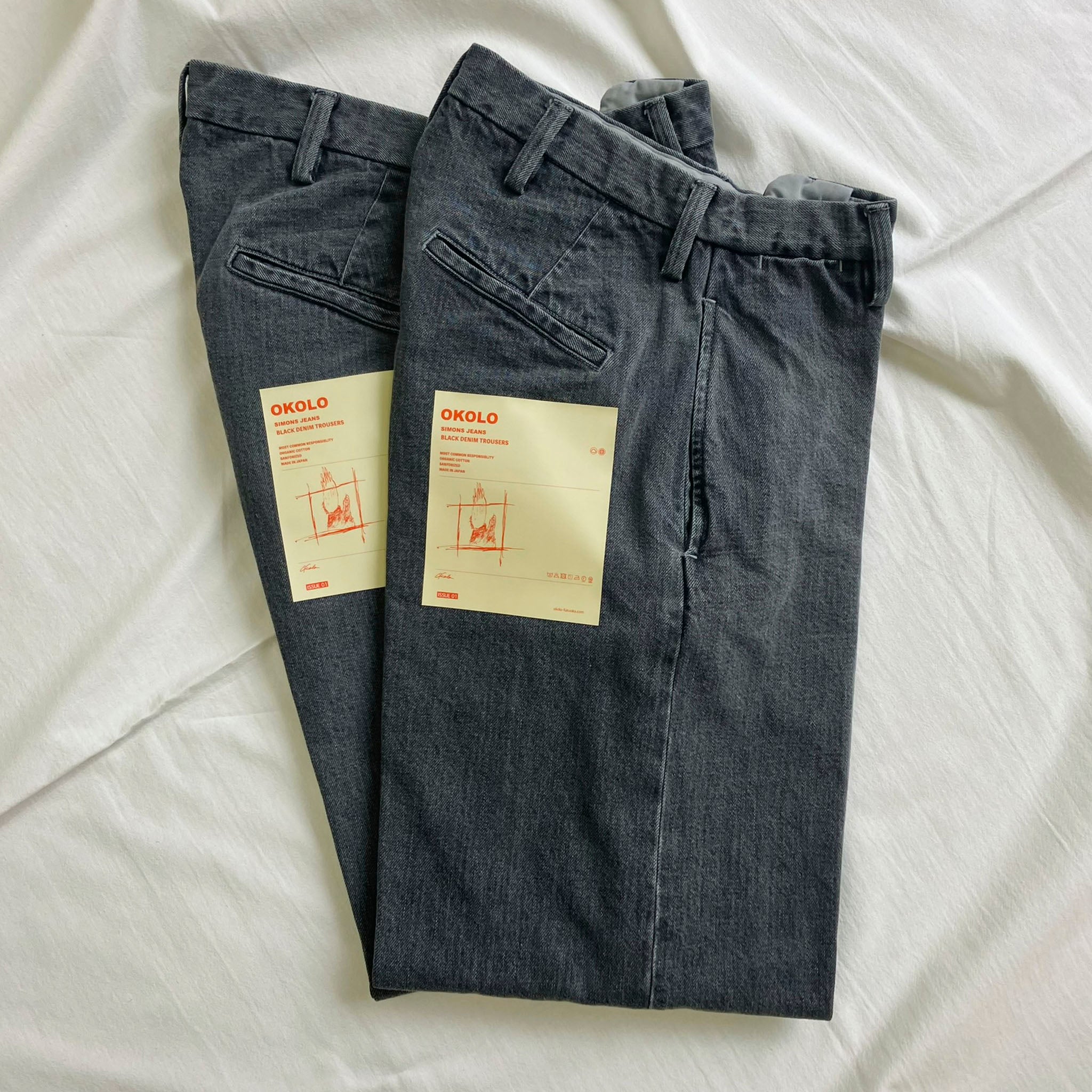 OKOLO "SIMONS JEANS" FADE BLACK DENIM TROUSERS