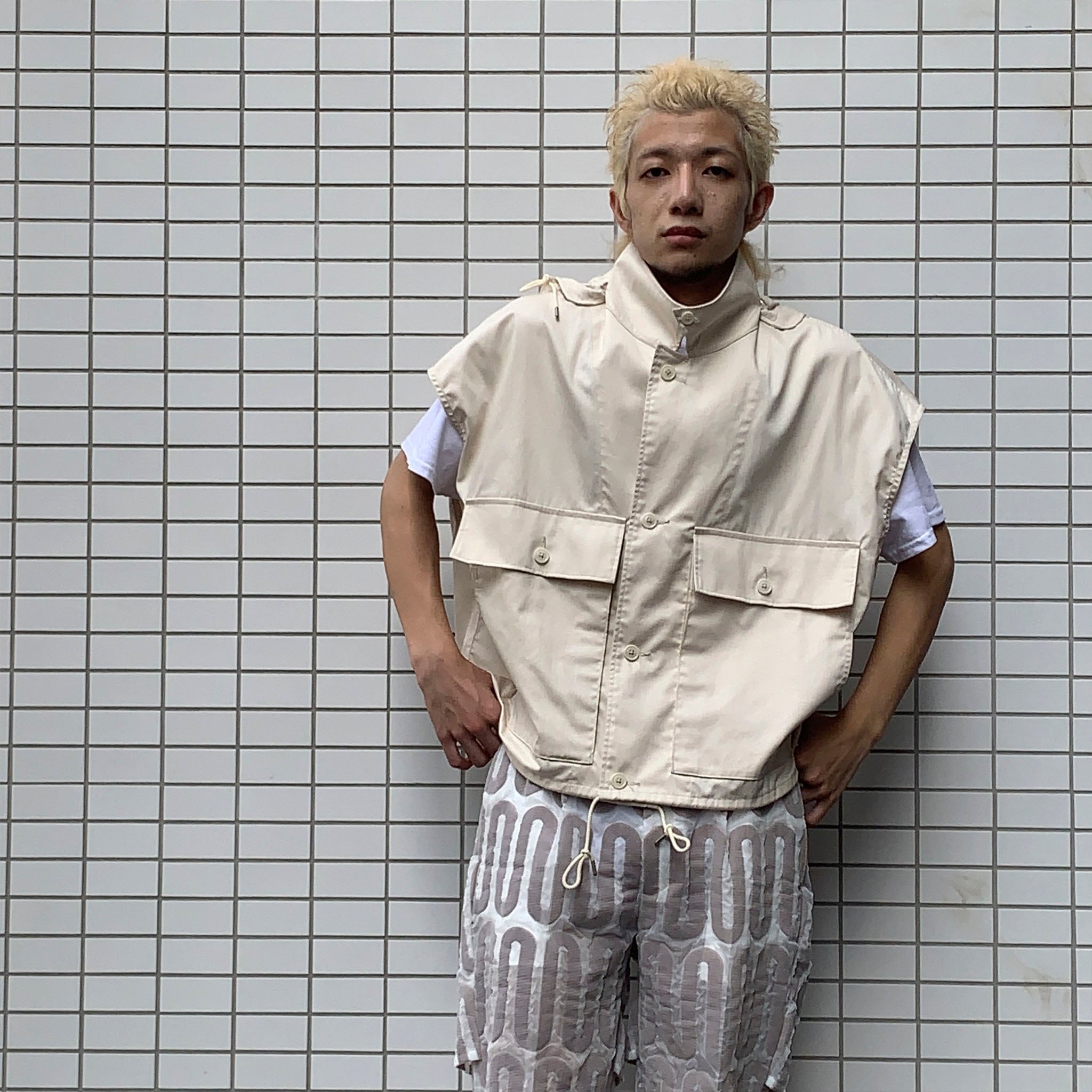 PRODUCT TWELVE "SHORT LENGTH HOODED VEST"