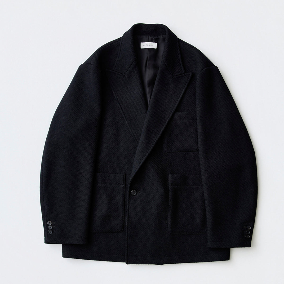 ENCOMING 黒いダブルジャケットの物撮り